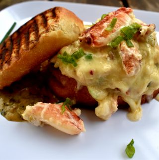Rich, buttery Dungeness crab, sharp white cheddar and fire roasted tomatillo on a grilled sourdough toast.