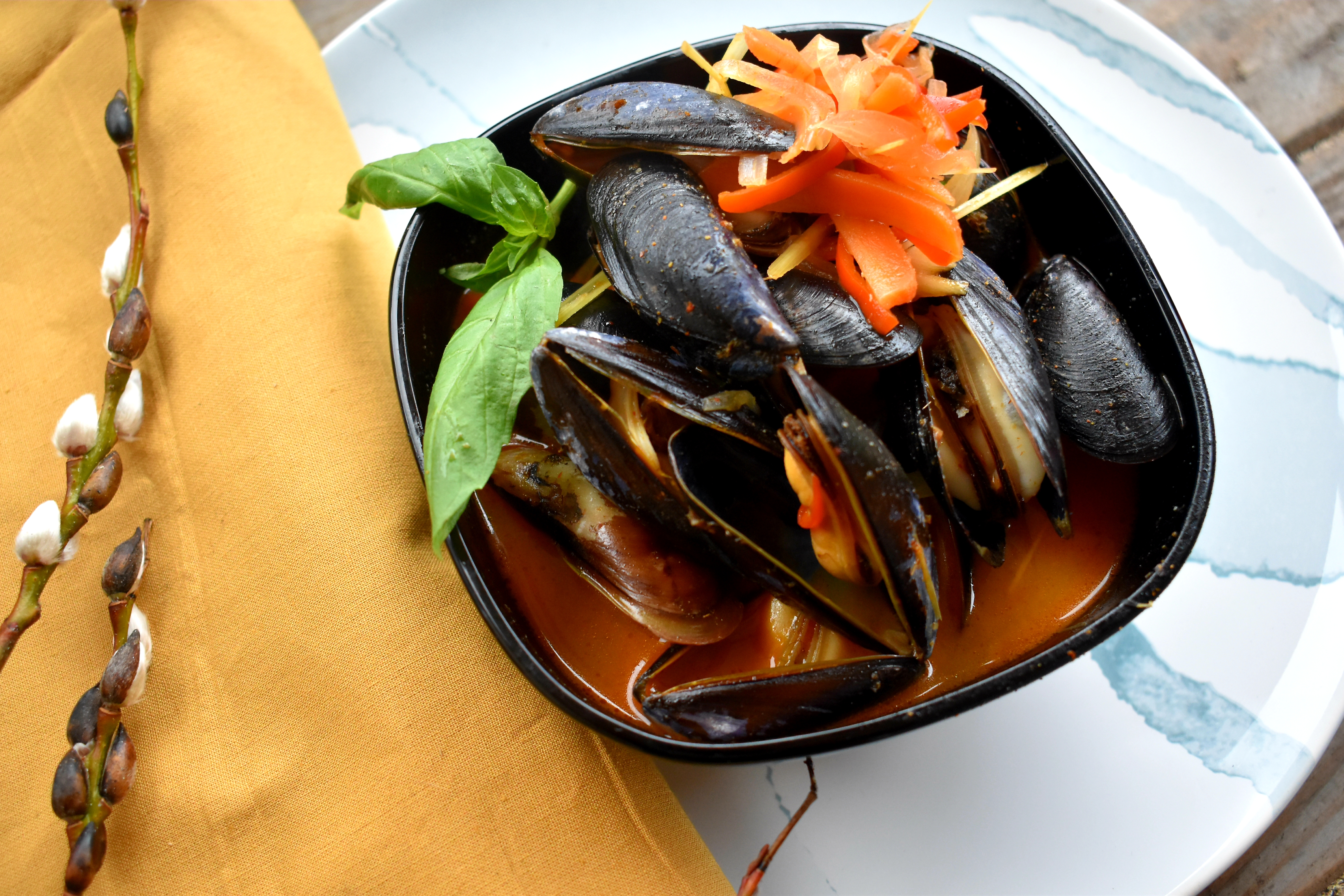 Penn Cove mussels get steamed in a coconut red curry broth