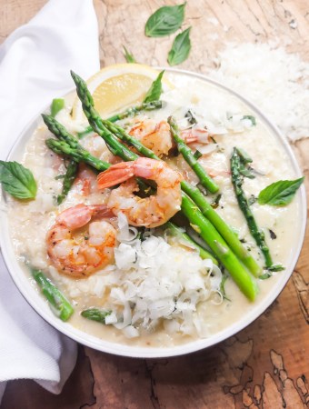 Creamy Shrimp and Asparagus Risotto is easy to make with Arborio rice, sautéed shallot, white wine and simmered broth.