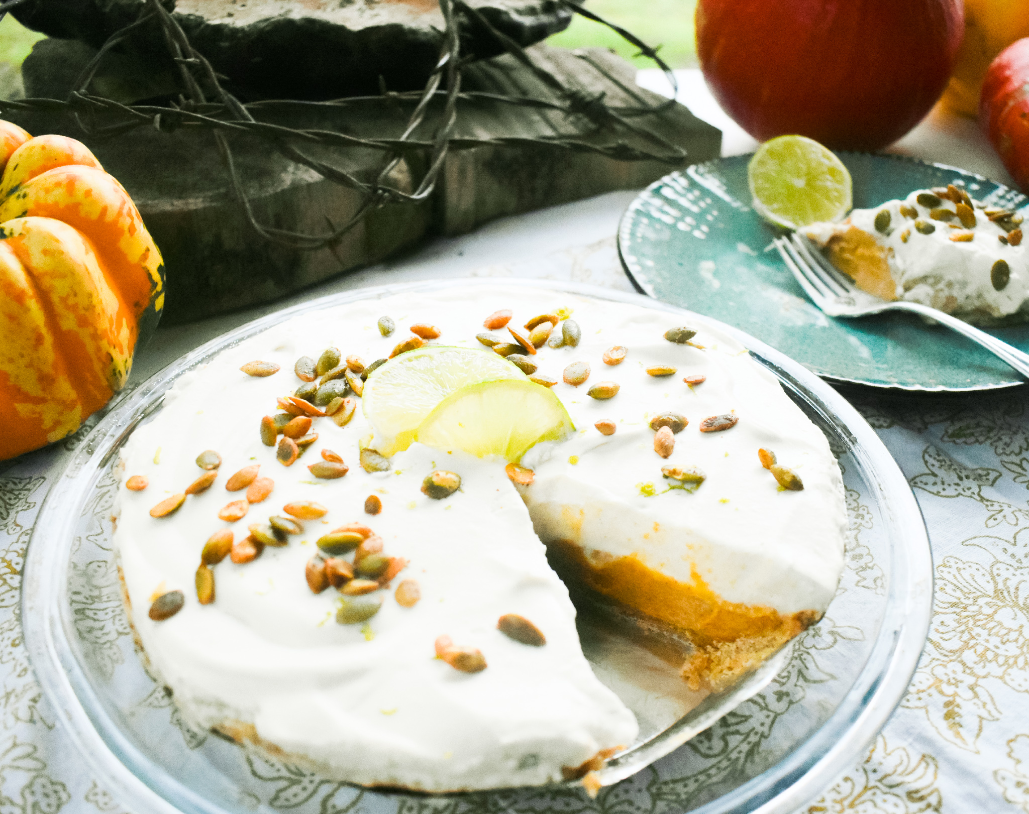 A perfect twist on the traditional, this Pumpkin Cream Pie with Chili Lime Pepitas combines layers of pumpkin and whipped cream over a graham cracker crust.