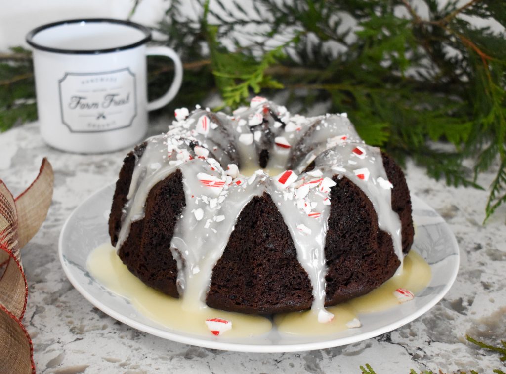 Peppermint Mocha Cake is a festive dessert sure to satisfy your sweet tooth. Rich, chocolate espresso cake topped with creamy mint frosting and crushed candy canes.
