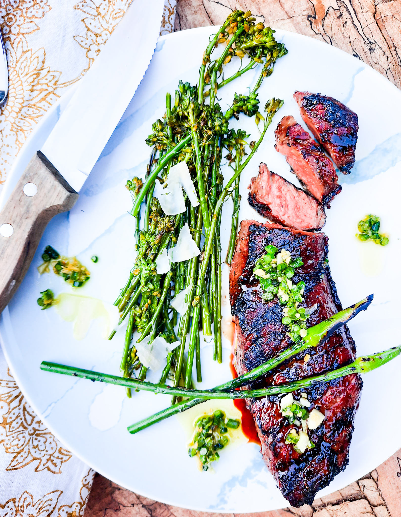 Tender short rib steak with balsamic glaze, quickly grilled and topped with leek scape butter