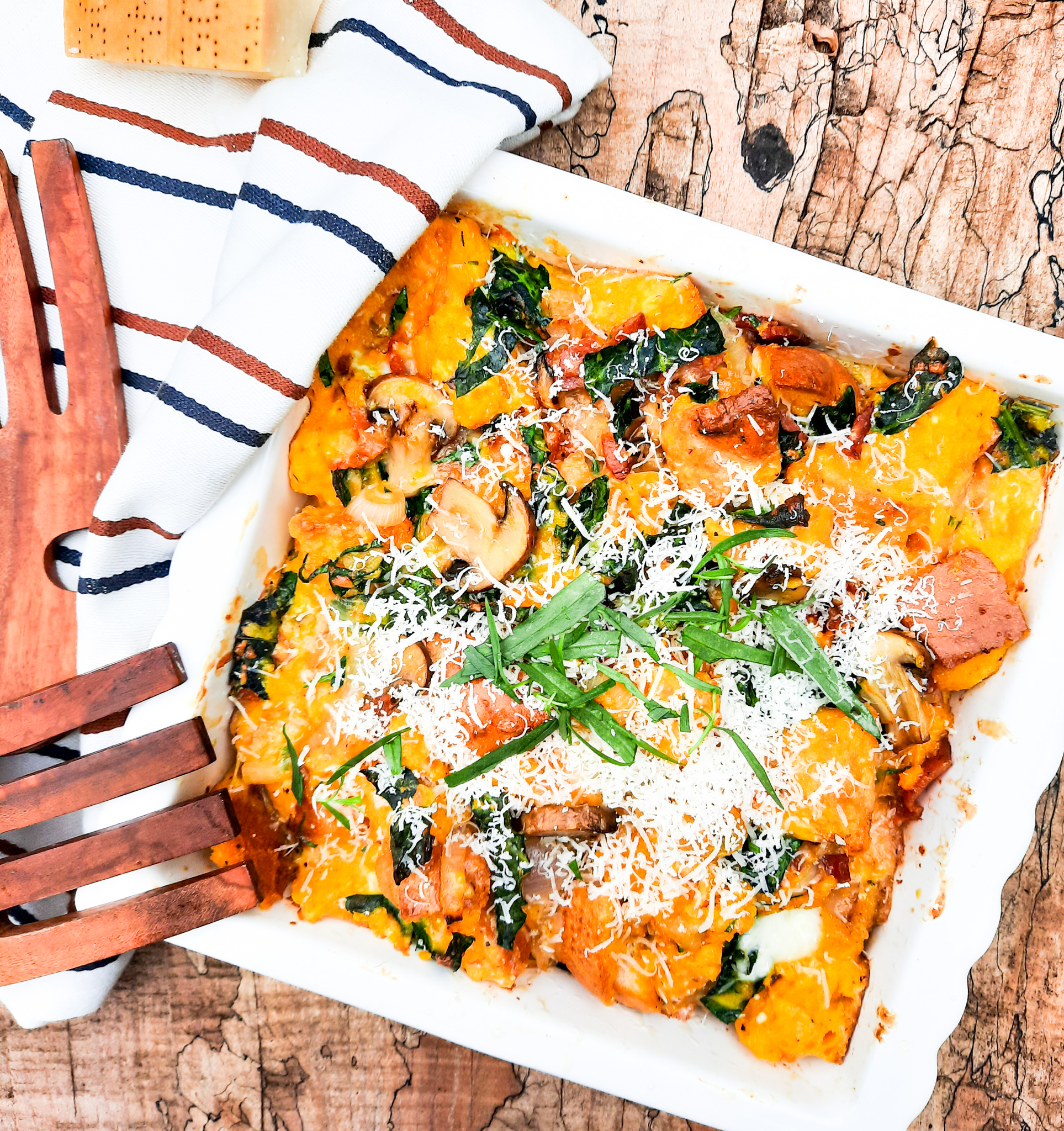 French tarragon transforms this Mushroom Tarragon Strata into an elegant breakfast dish with rustic bread, leafy kale, bacon and parmesan.