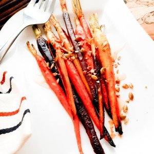 An easy side dish full of flavor, Roasted Spiced Carrots with Agave and Pepitas bring rustic elegance to your table.