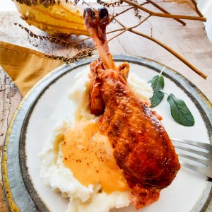 A blend of red chiles, spices and orange juice produce a flavorful skin on this Out West inspired Chile Rubbed Smoked Turkey