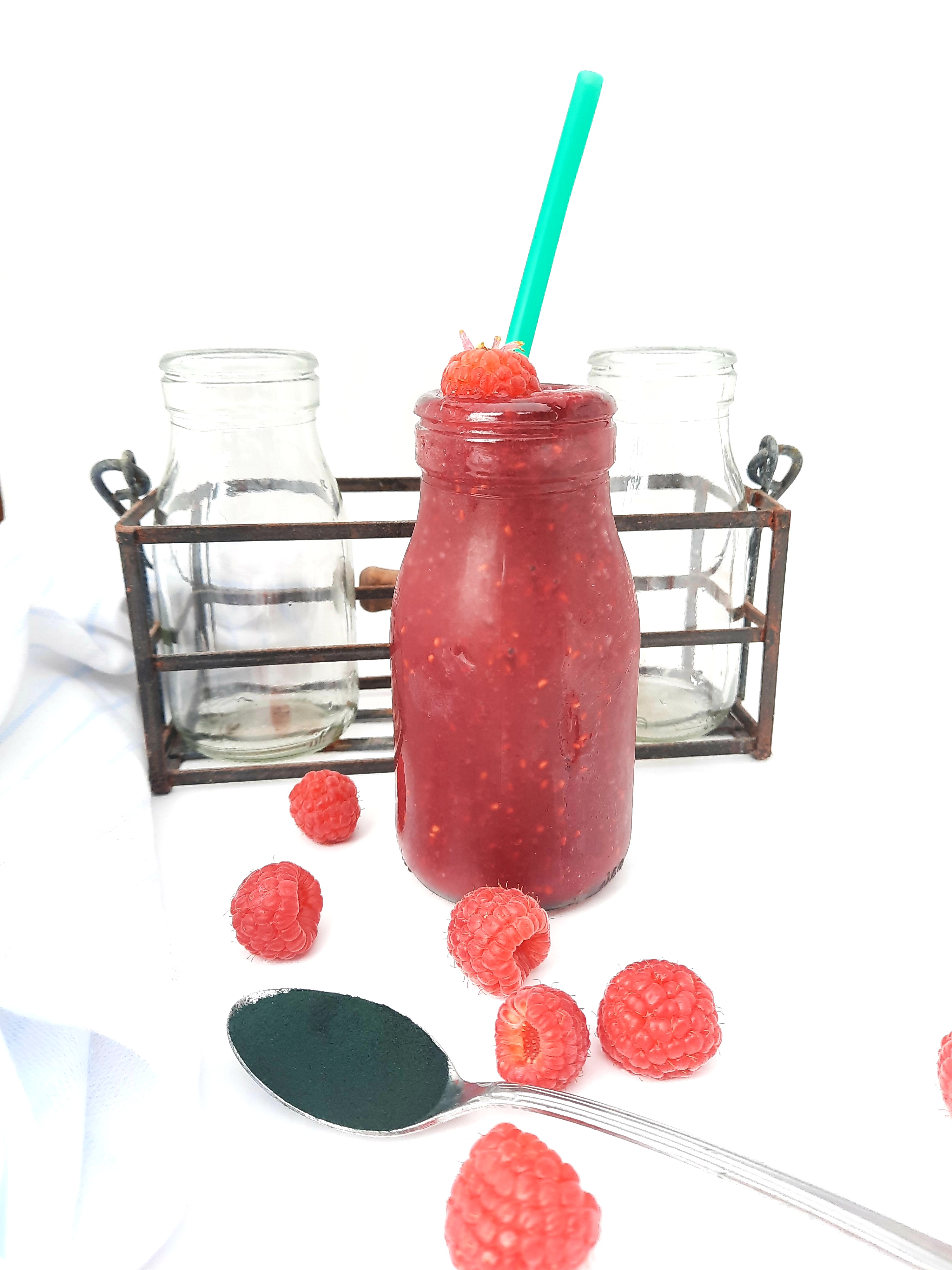 Spirulina Pomegranate Raspberry Smoothie combines three powerful anti-oxidants along with vitamins and minerals for a healthy drink.