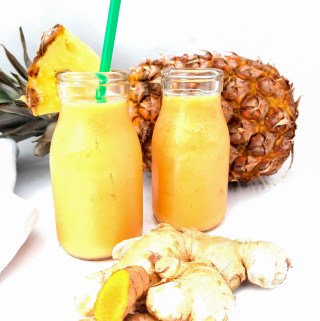 Tropical Tumeric Ginger Smoothie combines anti-inflammatory curcumin compounds with pineapple and guava to make a delicious drinkable breakfast to start your day the healthy way.