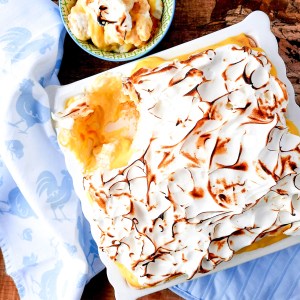 This No Bake Banana Dream Dessert combines layers of lady fingers, bananas, vanilla pudding, whipped cream and it's topped with toasted meringue.