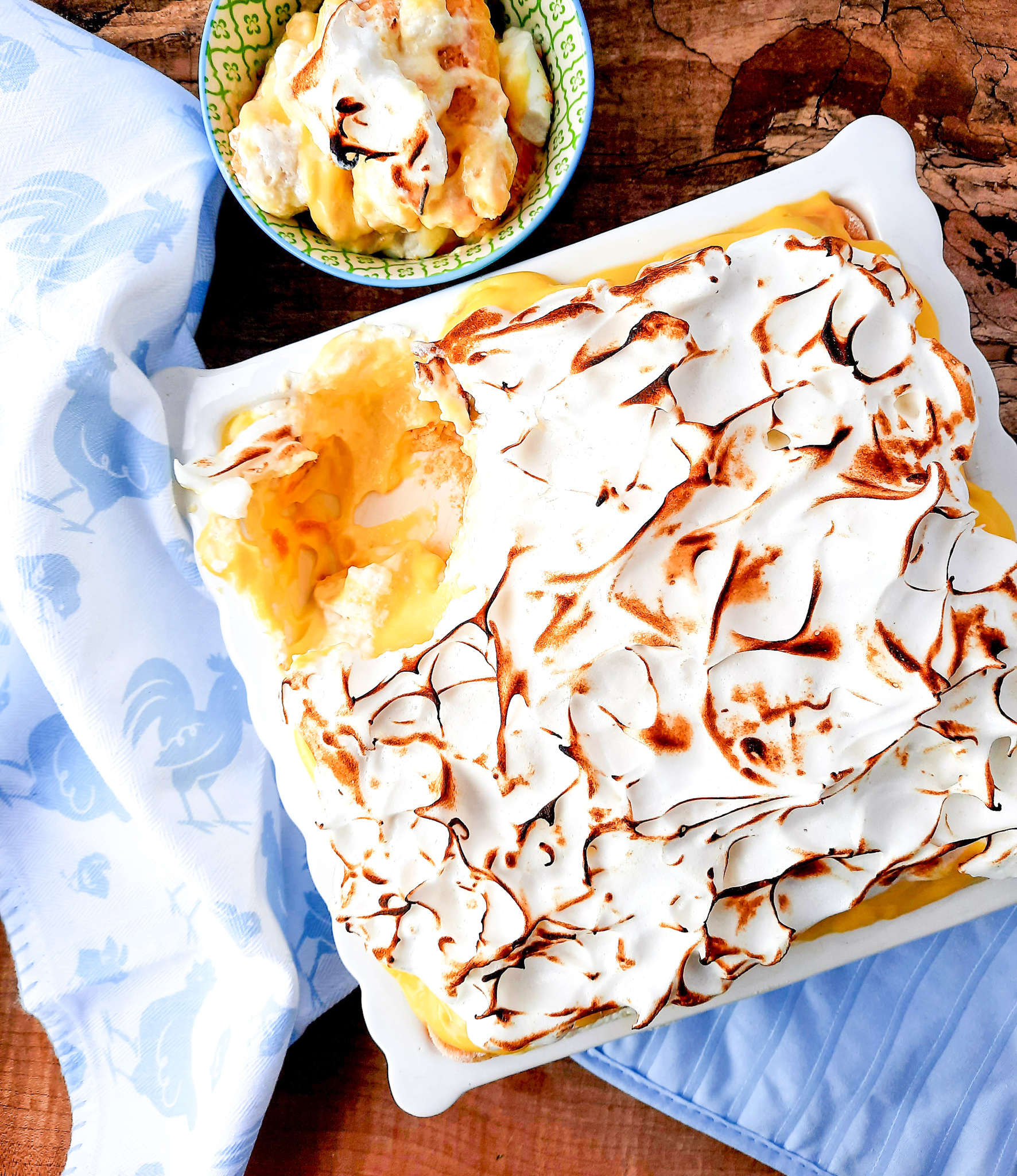 This No Bake Banana Dream Dessert combines layers of lady fingers, bananas, vanilla pudding, whipped cream and it's topped with toasted meringue.