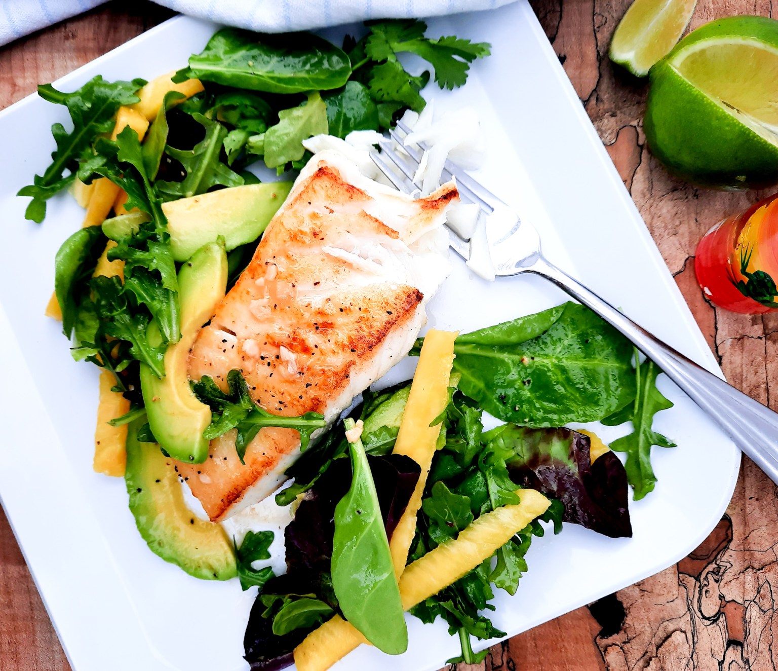 Light and refreshing Avocado Pineapple Salad with Halibut takes Summer into full swing and simplifies your weeknight dinner.