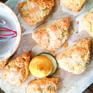 Bright and Citrusy Lemon Zucchini Scones are made bakery style with plenty of shredded zucchini and a sweet lemon zest glaze.
