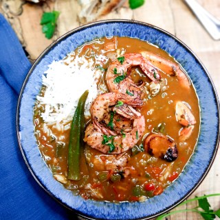 Seafood Gumbo is rich and flavorful from a dark roux with crab, shrimp and spicy andouille sausage.