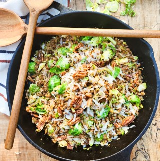 Farro, Brussels Sprouts and Pecan Salad lightly fried with thinly sliced shallot, shaved parmesan and balsamic glaze.
