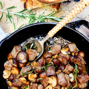 Steak Bites with Herby Mushrooms is a delicious one pan meal ready in less than 15 minutes with very few ingredients.