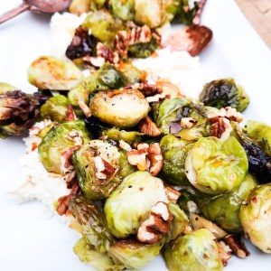 Roasted Brussels Sprouts with honey whipped goat cheese, toasted pecans, dried tart cherries and hot honey drizzle.