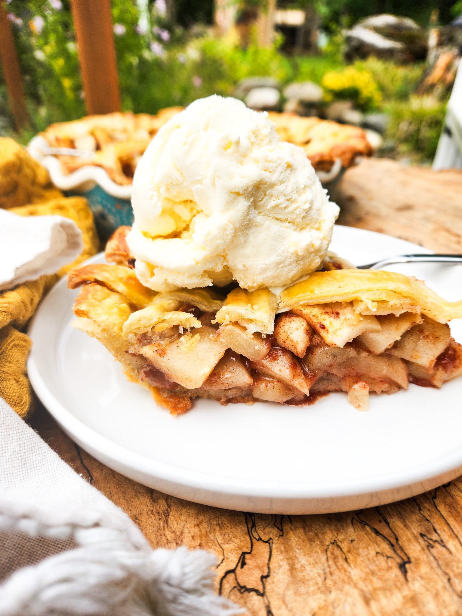 Nona's Apple Pie with All Butter Crust combines layers of tart Granny Smith apples tossed in a cinnamon sugar mixture and a super flaky crust.