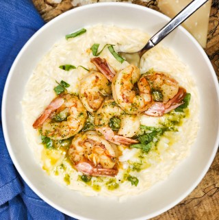 Creamy Shrimp Orzo with Basil Oil combines tender orzo in a parmesan cream sauce with quickly cooked shrimp and an herby basil oil drizzle.