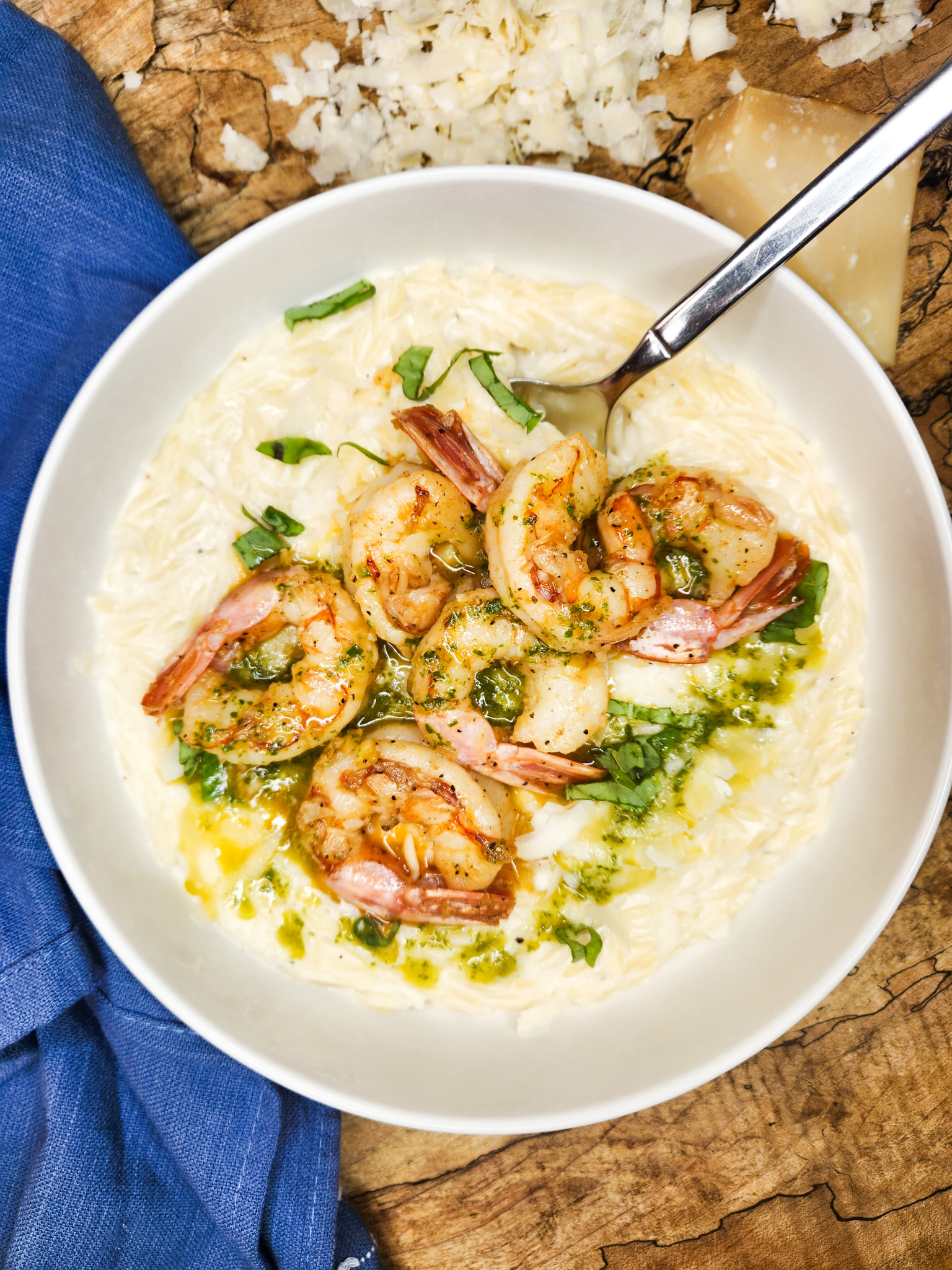 Creamy Shrimp Orzo with Basil Oil combines tender orzo in a parmesan cream sauce with quickly cooked shrimp and an herby basil oil drizzle.