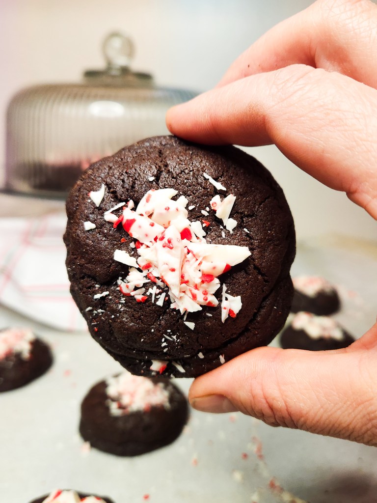 Peppermint Crunch Cookies are a rich and chewy chocolate cookie dipped in creamy white chocolate and peppermint candies.