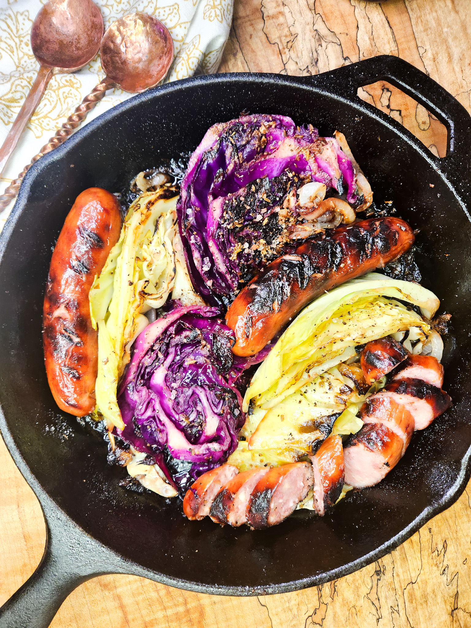 Blistered Sauerkraut with Sausage is a quick and flavorful dish with charred cabbage and hints of caraway, fennel and malt vinegar.