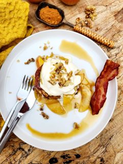 Caramel Apple French Toast uses leftover French bread topped with caramelized apples, fresh whipped cream and walnuts.