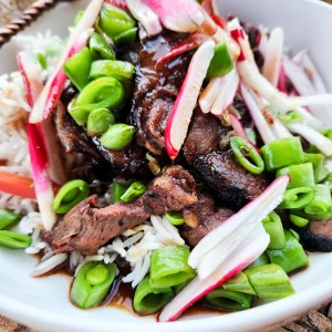 Thai Grilled Beef Bowls combines grilled steak marinated in Pad Thai sauce with cabbage, red pepper, sugar snap peas and radish.