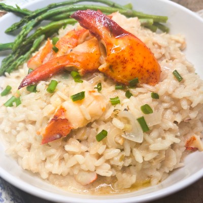 Lobster Risotto is rich and creamy made with arborio rice and plenty of melt in your mouth pieces of lobster.