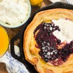 Lemon Blueberry Dutch Baby is light, fluffy and simple to make with blueberry sauce and lemon scented whipped cream.