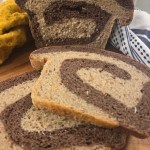 Marbled Sourdough Rye Bread is the best of both dark and light rye bread with sourdough layered and rolled together.