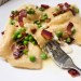 Lemon Ricotta Ravioli with Bacon and Peas is made from scratch coated in a white wine, garlic butter sauce.