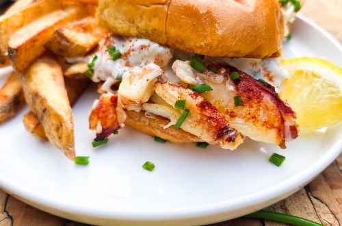 Dungeness Crab Sliders are rich, buttery and indulgent with lemon mayonnaise, fresh chives and smoked paprika on a brioche slider bun