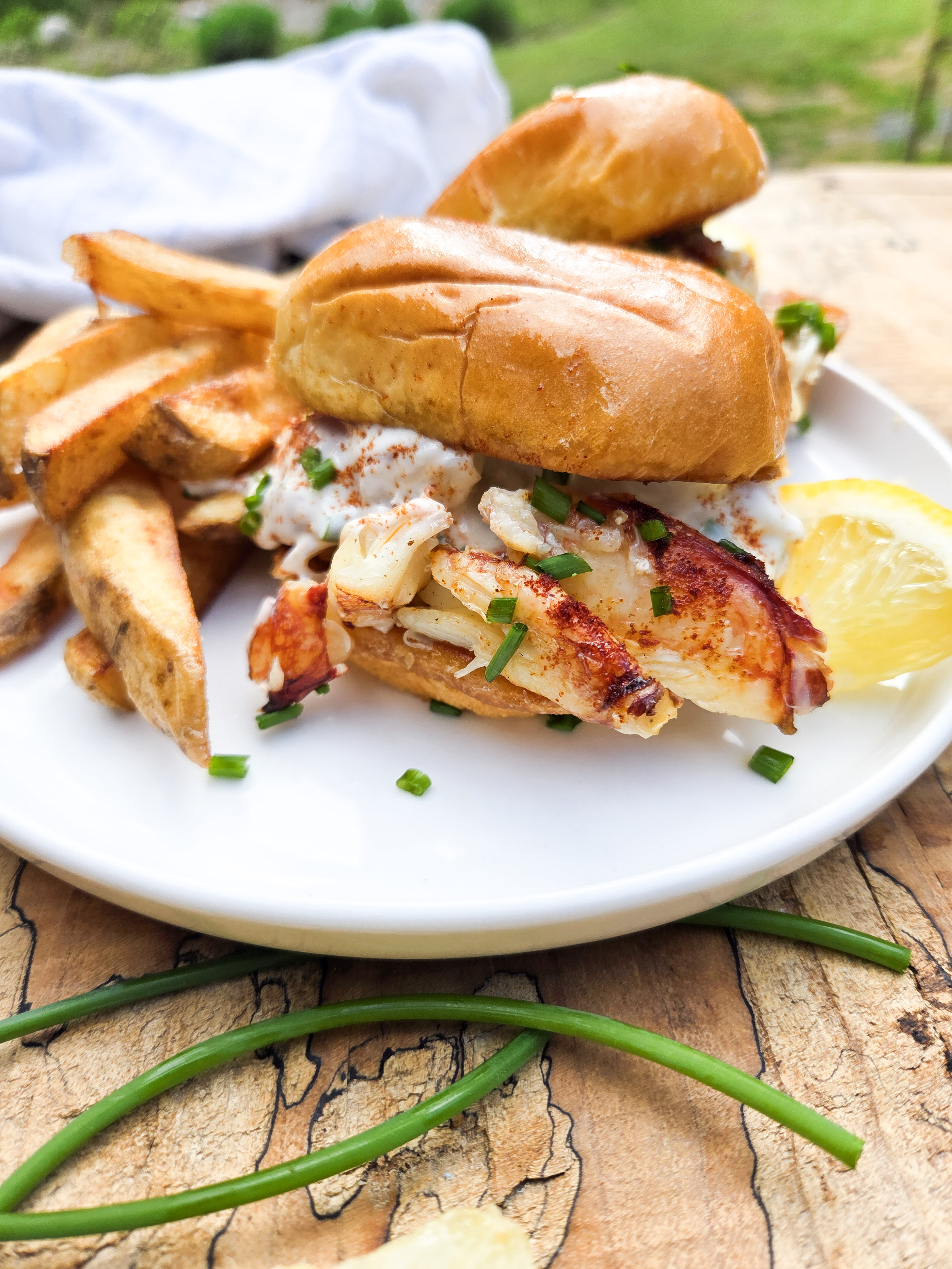 Dungeness Crab Sliders are rich, buttery and indulgent with lemon mayonnaise, fresh chives and smoked paprika on a brioche slider bun